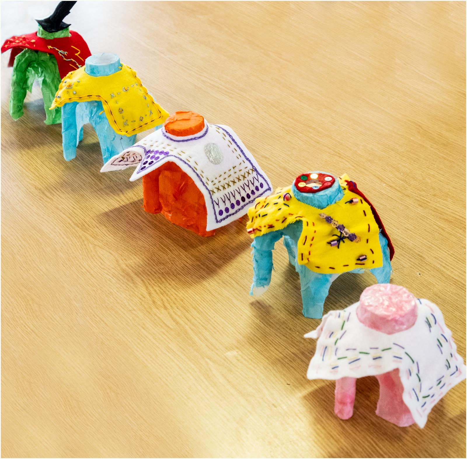 6 Elephants with decorated blankets