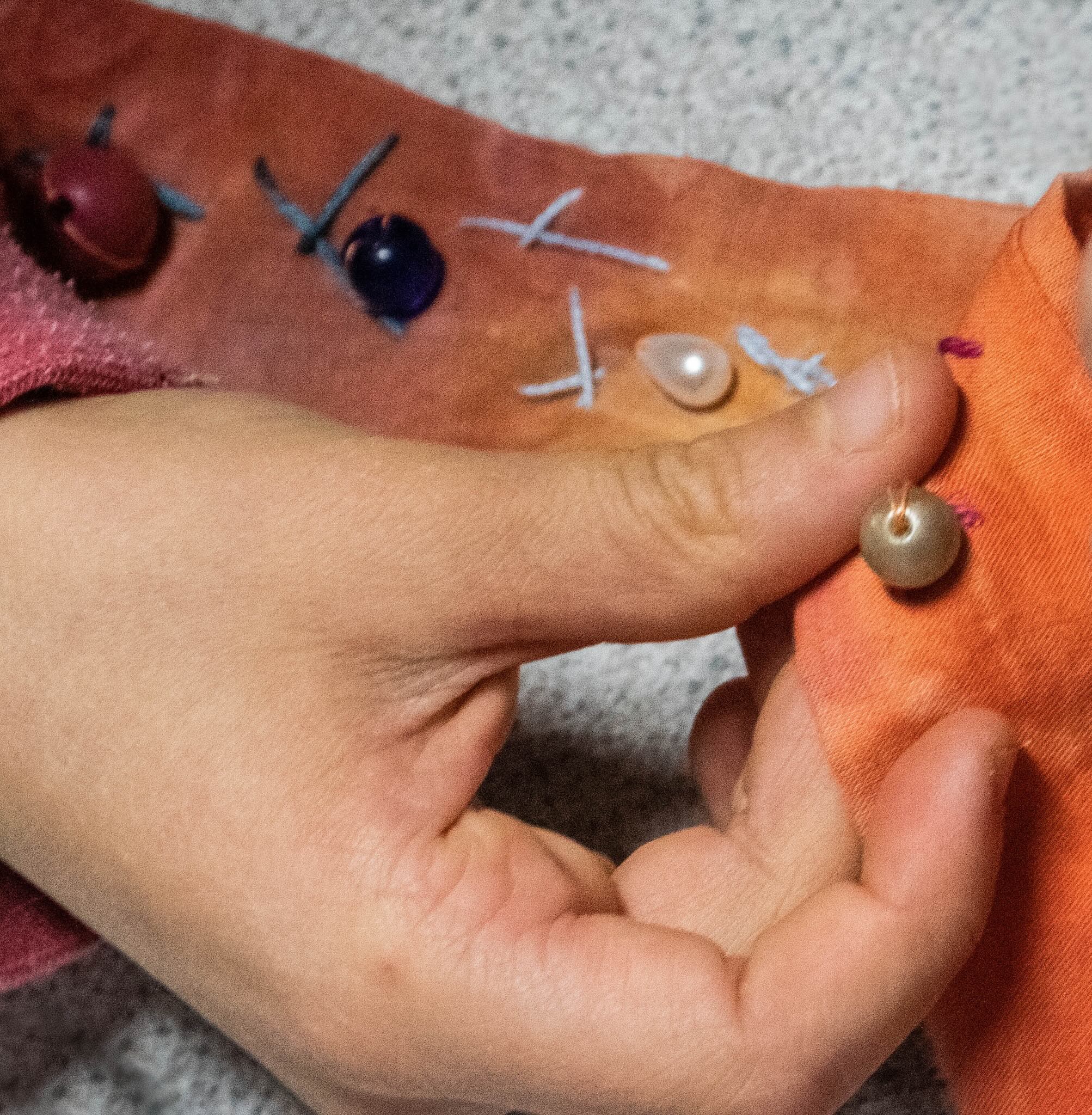 Applying decorative beads & buttons