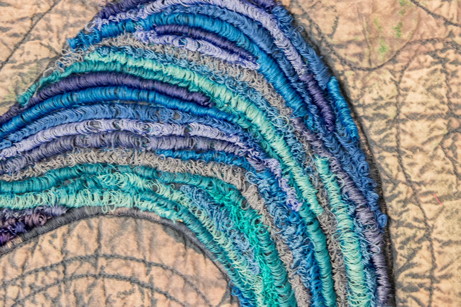 Detail of swirls - looped satin stitch