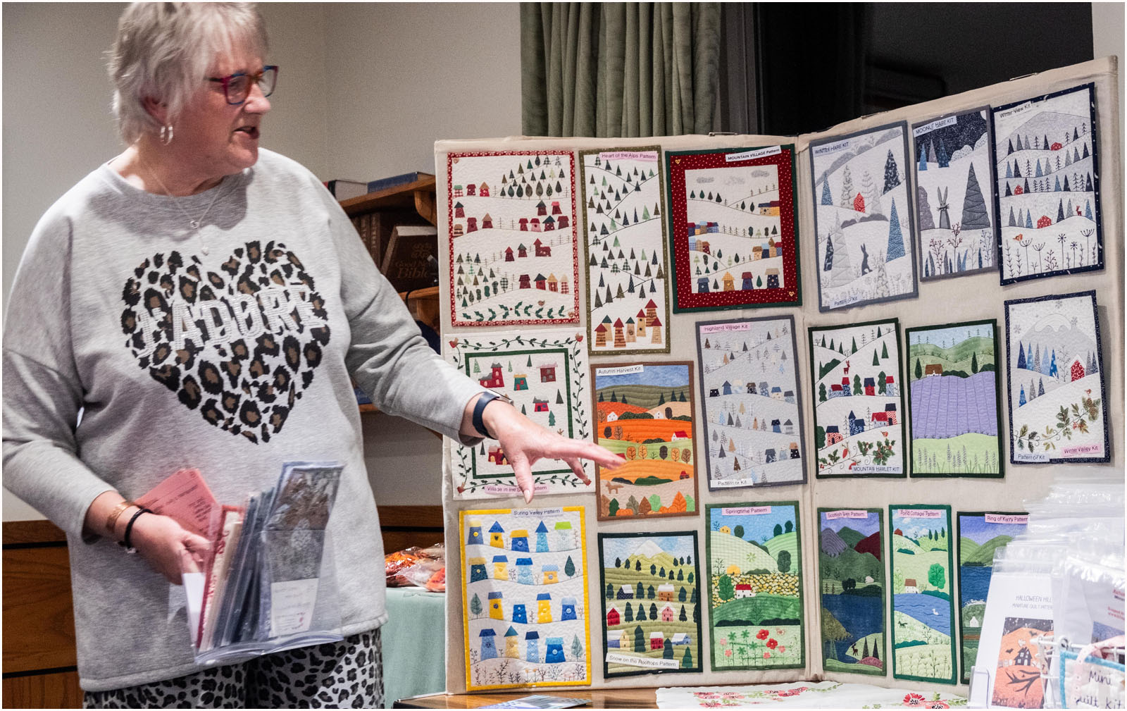 Julia with some of her mini quilts
