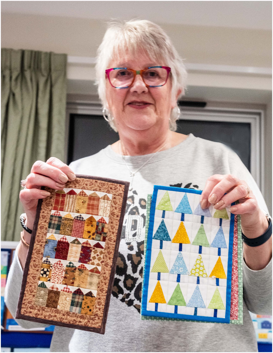 Julia with two of her early quilts
